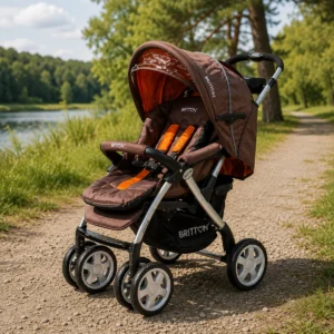 Britton Allroad brown and orange pushchair outdoors