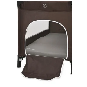 Britton Lagom mattress positioned through the travel cot side opening