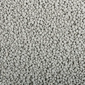 Close-up texture of KittyClean Compact Plus natural bentonite cat litter