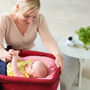 Bebcare iQ baby monitor camera in use with a family