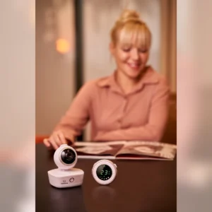Bebcare iQ baby monitor set on a table – portrait view